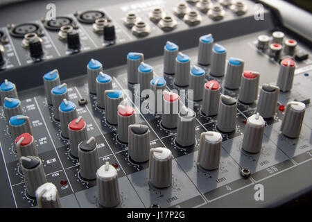 Mixer table with several knobs Stock Photo
