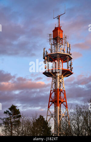 Small radio tower at sunset on the Oschenberg, Bayreuth, Germany. Stock Photo