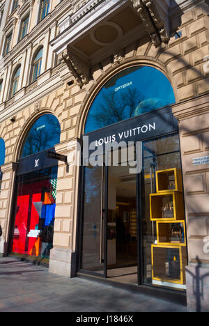 Woman Choosing Hand Bags In Louis Vuitton Store In Helsinki Stock
