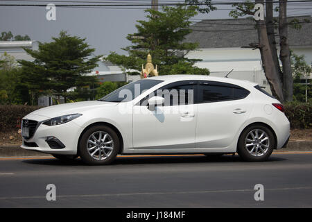 CHIANG MAI, THAILAND -APRIL 10 2017: Private car, Mazda 3. On road no.1001, 8 km from Chiangmai Business Area. Stock Photo