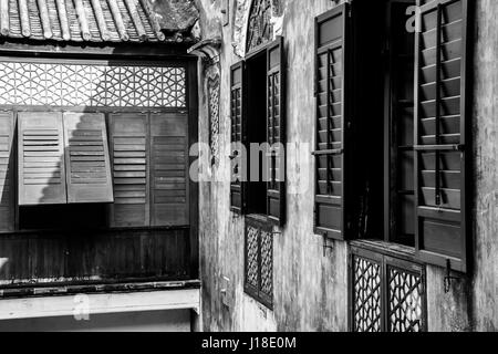 Chinese traditional windows on the historical mansion in black and white color Stock Photo