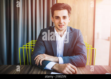 happy young business man portrait in bright modern office Stock Photo