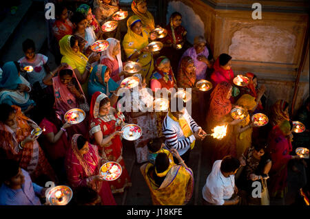 People holding aarti, yamuna river, vrindavan, uttar pradesh, india, asia Stock Photo