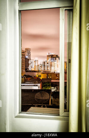 View from inside a window at night. Curitiba, Parana, Brazil. Stock Photo