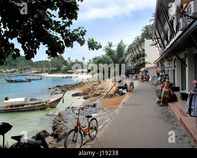 Tourists shop at the old town market walking street. Ton Sai Village. Koh Phi Phi Don in andaman sea, Phuket, Krabi, South of Thailand. Stock Photo