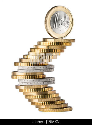 one euro coin standing on top of coin stack shaping the euro currency symbol isolated on white background Stock Photo