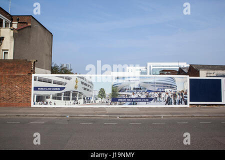 Advertising boards around White Hart Lane Football stadium promising urban regeneration that will come with a new stadium. Tottenham Football Club als Stock Photo