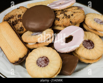 Selection of Teatime Biscuit Snacks Served on a Plate Stock Photo