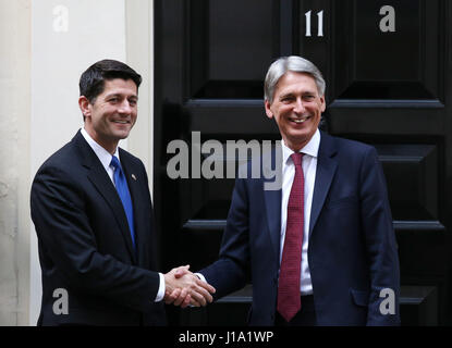 Chancellor Philip Hammond greets US Speaker of the House of Representatives Paul Ryan as he arrives for talks at 11 Downing Street, London. Stock Photo