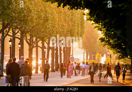 People walking on pavement. Stock Photo