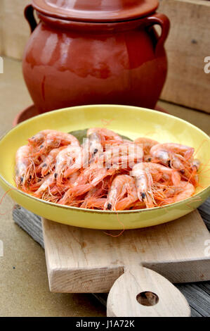 Dish with prawns on wood Stock Photo
