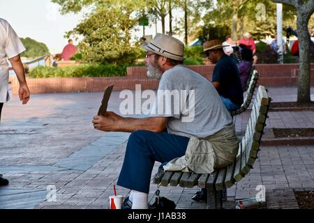 Homeless veteran holding sign Stock Photo