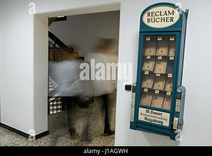 Ditzingen, Germany. 03rd Feb, 2017. A historical Reclam book vending machine hangs on a wall at the company's HQ in Ditzingen, Germany, 03 February 2017. The company celebrates this year the 150th anniversary of its Universal-Bibliothek line of books, the oldest book series in the german book market. Photo: dpa/Franziska Kraufmann/dpa/Alamy Live News Stock Photo