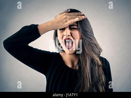 Brunette woman forgetting something Stock Photo
