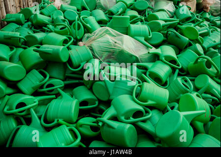 Watering cans from donors awaiting distribution to small-scale farmers in Faradje, north east Democratic Republic of Congo Stock Photo