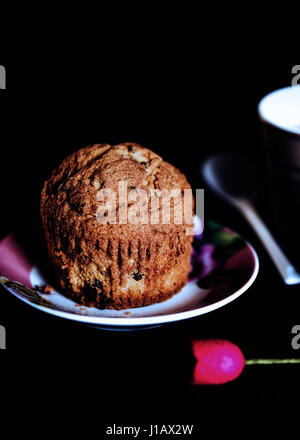 Muffin in a dark romantic set Stock Photo