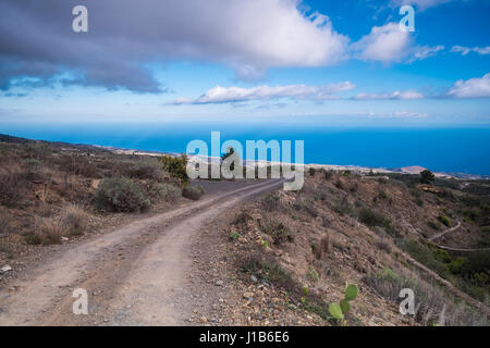 Dirt path near ocean, Arona, Tenerife, Spain Stock Photo