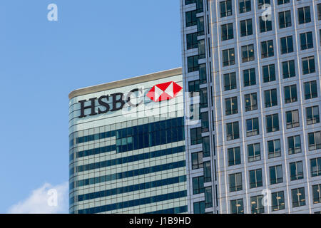 HSBC bank logo sign on the HSBC HQ office building in Canary Wharf, Docklands, London, England Stock Photo