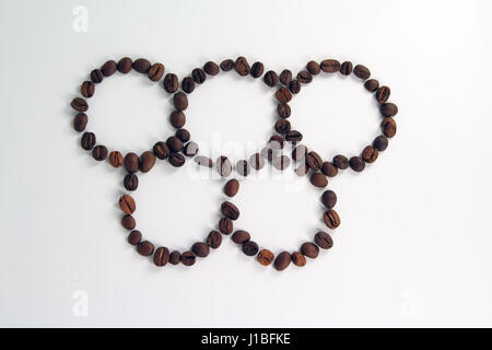 Olympic circles shaped coffee beans. Olympics in Rio. Stock Photo