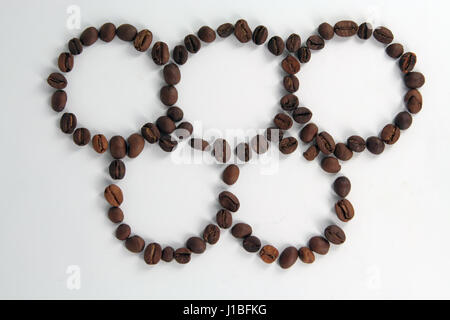 Olympic circles shaped coffee beans. Olympics in Rio. Stock Photo