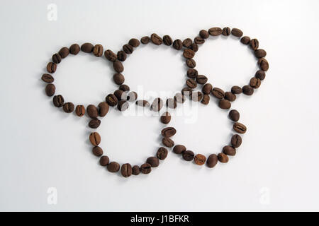 Olympic circles shaped coffee beans. Olympics in Rio. Stock Photo