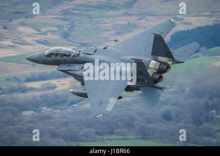 United States Air Force McDonnell Douglas F-15E Strike Eagle low level in the world famous Mach Loop Wales Stock Photo