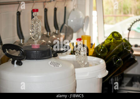 fermentation barrels for home brewed beer at home in a kitchen in the uk Stock Photo