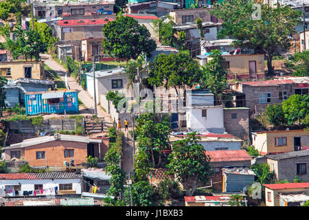 DURBAN, SOUTH AFRICA - APRIL 18, 2017: Above Close up view of crowded low cost residential housing settlement landscape in Durban, South Africa Stock Photo