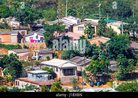 DURBAN, SOUTH AFRICA - APRIL 18, 2017: Above Close up view of crowded low cost residential housing settlement landscape in Durban, South Africa Stock Photo