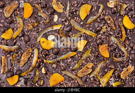 Chocolate bar with dried fruit and nuts, could be used as background Stock Photo