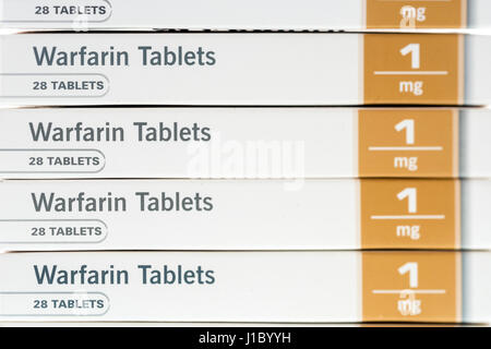 Warfarin tablets used to treat or prevent blood clots in veins or arteries, which can reduce the risk of strokes or heart attacks. Stock Photo