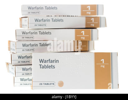 Warfarin tablets used to treat or prevent blood clots in veins or arteries, which can reduce the risk of strokes or heart attacks. Stock Photo