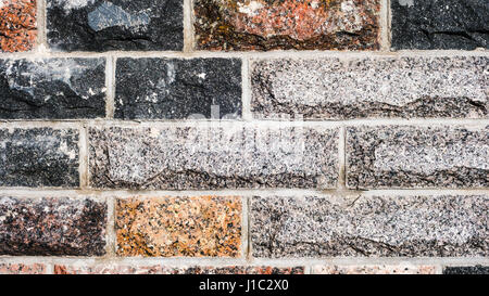 Seamless texture, background, stone lined with granite walls. sandstone. stone background wall. Facing Stone Stock Photo