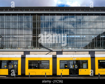 Yellow tram at Alexander Platz railway station in Berlin, Germany Stock Photo