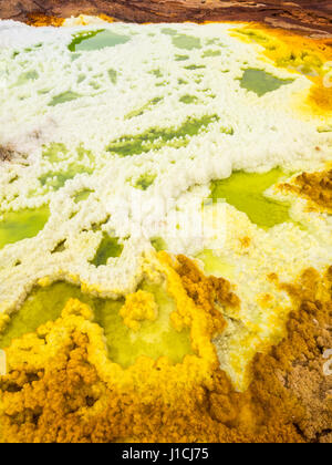 Mineral formations at sulphur lake Dallol in a volcanic crater in the Danakil Depression, northeast of the Erta Ale Range in Ethiopia. The lake with i Stock Photo