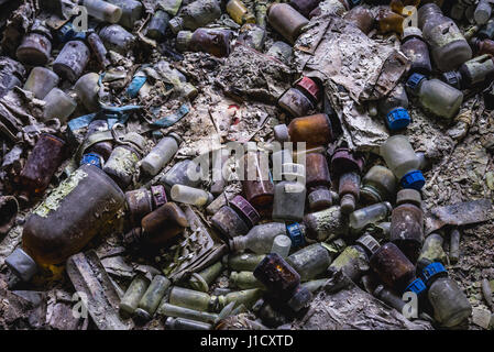 Old drugs bottles in Hospital No. 126 of Pripyat ghost city, Chernobyl Nuclear Power Plant Zone of Alienation around nuclear reactor disaster, Ukraine Stock Photo