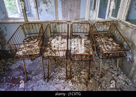 Maternity ward in Hospital No. 126 of Pripyat ghost city, Chernobyl Nuclear Power Plant Zone of Alienation around nuclear reactor disaster, Ukraine Stock Photo