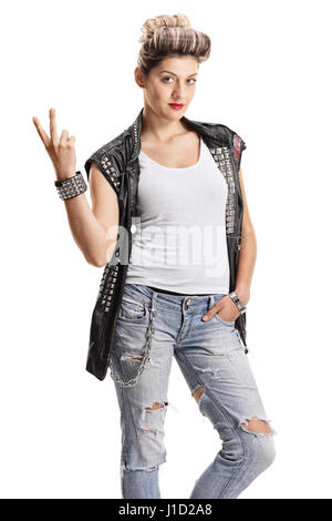 Punk girl making a peace sign and looking at the camera isolated on white background Stock Photo