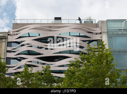 Facade of Suites Avenue apartments at Passeig de Gracia, 83 in Barcelona, Spain. Building was designed by famous Japanese architect Toyo Ito. Stock Photo