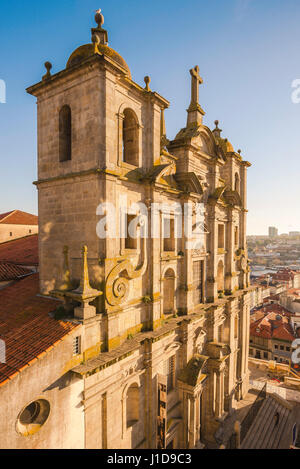 Porto Portugal old town church, the baroque facade of the Igreja de Sao Lourenco illuminated at sunset in the central old town area of Porto (Oporto). Stock Photo