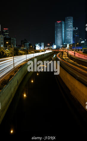 Israel, Tel Aviv, Long exposure Night shot of Ayalon highway Azrieli high rises on the right Stock Photo