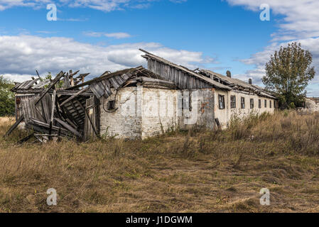 Old kolkhoz in abandoned Mashevo village of Chernobyl Nuclear Power Plant Zone of Alienation area around nuclear reactor disaster in Ukraine Stock Photo