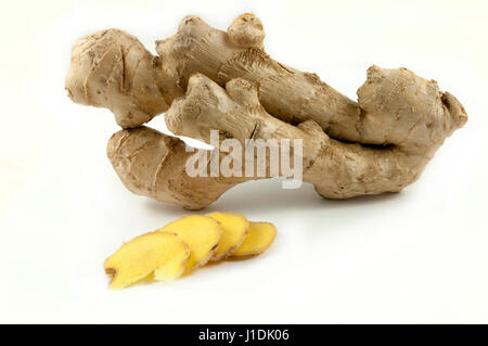 Ginger root with cut pieces Stock Photo