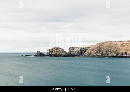 Farr Bay rocks in the sea in Sutherland, Scotland. Scottish Highlands Stock Photo