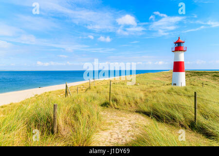 Ellenbogen lighthouse on sand dune and beach view on northern coast of Sylt island, Germany Stock Photo