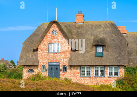 Typical Frisian house with thatched roof on Sylt island, Germany Stock Photo