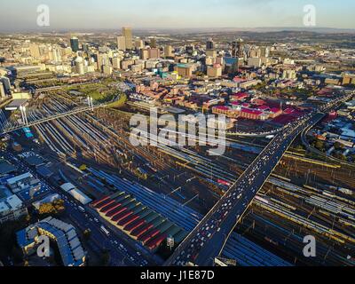 Johannesburg. 20th Apr, 2017. Photo taken on April 20, 2017 shows an aerial view of Johannesburg Town, South Africa. The City of Johannesburg Local Municipality is situated in the northeastern part of South Africa with a population of around 4 million. Being the largest city and economic center of South Africa, it has a reputation for its man-made forest of about 10 million trees. Credit: Zhai Jianlan/Xinhua/Alamy Live News Stock Photo