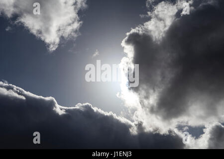Large dramatic storm clouds covering the sun. Stock Photo