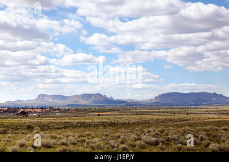 Utah Landscape with mountains and house. Stock Photo