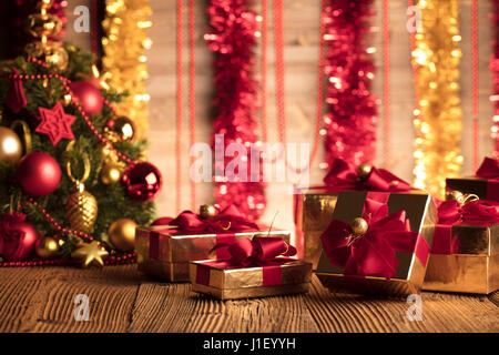 Christmas theme. Set of Christmas gifts on wooden table Stock Photo - Alamy